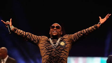 Floyd Mayweather showing off his Chanel bag 